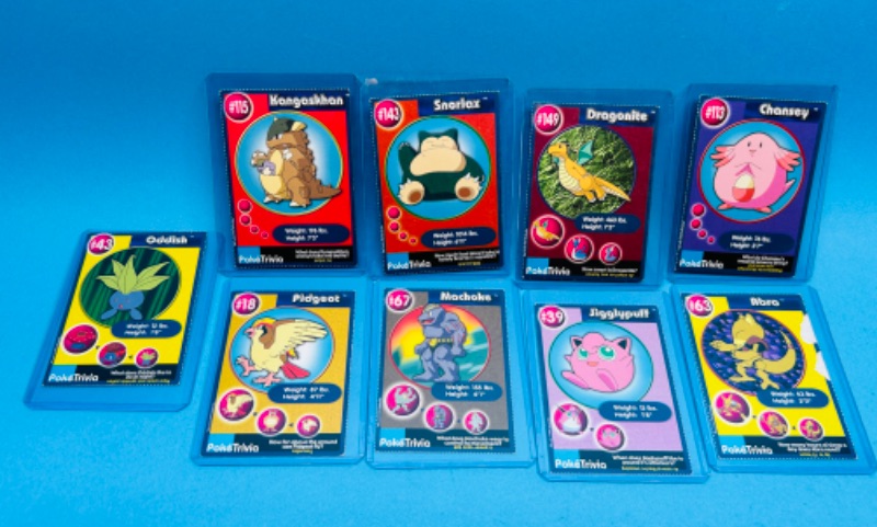 Photo 1 of 686625…9 Pokémon trivia cards in hard plastic sleeves 