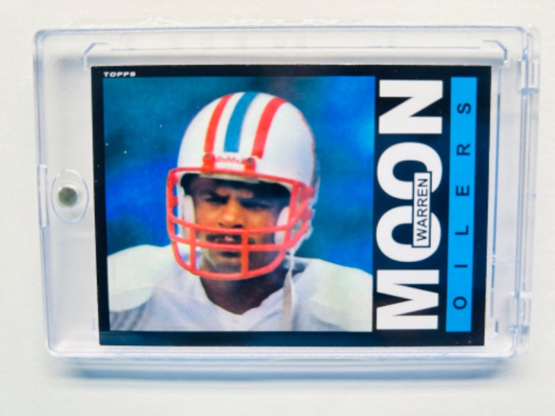 Photo 1 of 686645…topps Warren Moon rookie card 251 and hard plastic case