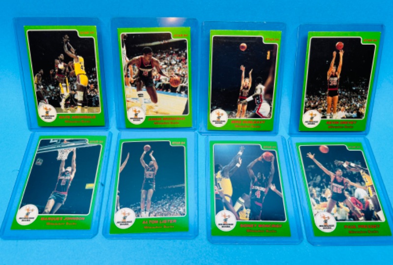 Photo 1 of 686648…8 vintage Milwaukee Bucks cards set in hard plastic sleeves 