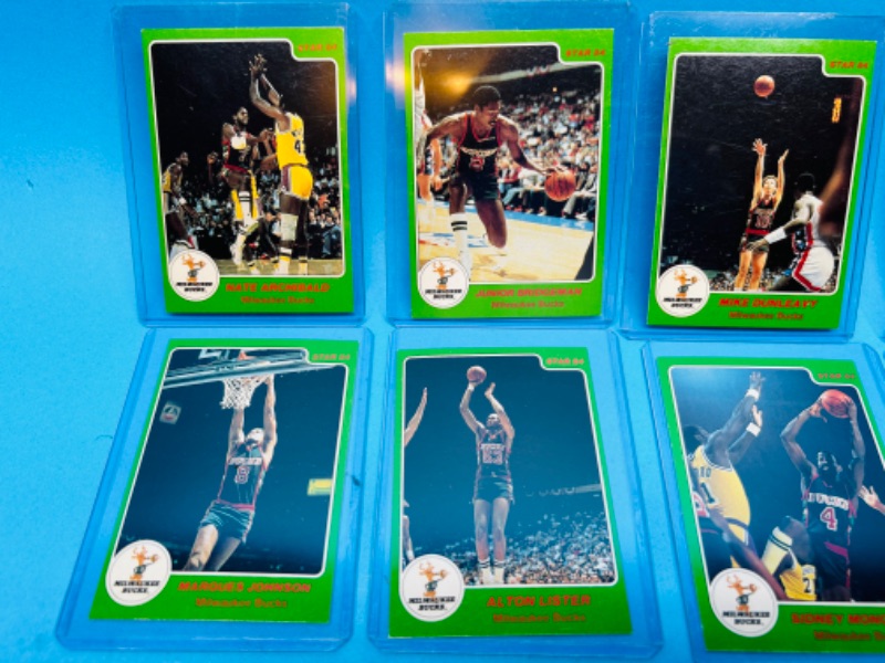 Photo 2 of 686648…8 vintage Milwaukee Bucks cards set in hard plastic sleeves 