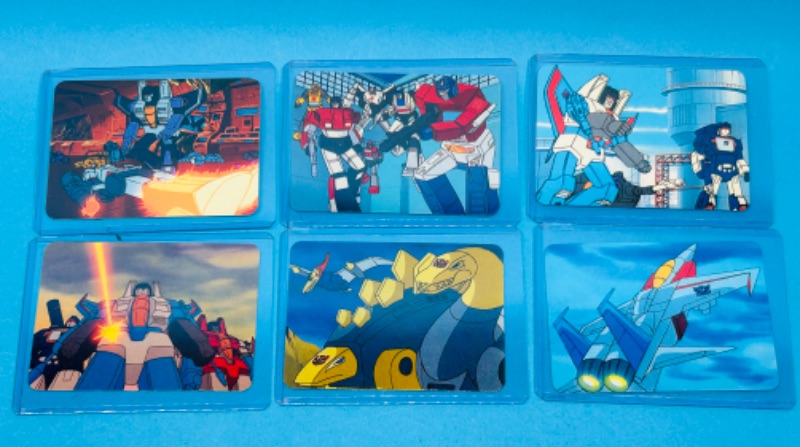 Photo 1 of 686660…6 1985 transformers series 1 cards in hard plastic sleeves 