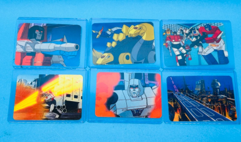 Photo 1 of 686662…6  1985 transformers series 1 cards in hard plastic sleeves 