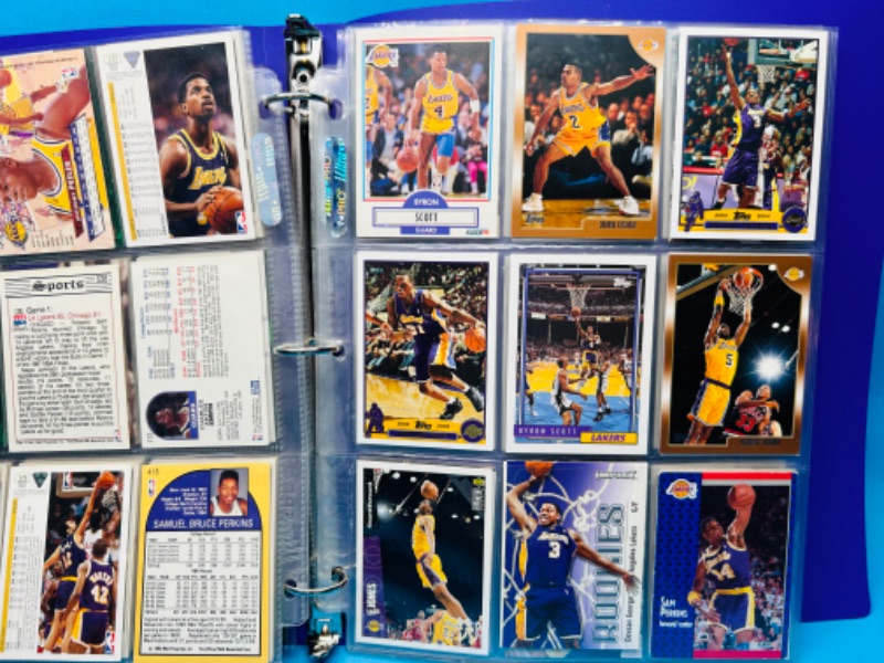 Photo 4 of 686669…90 mixed Lakers basketball team cards in binder 