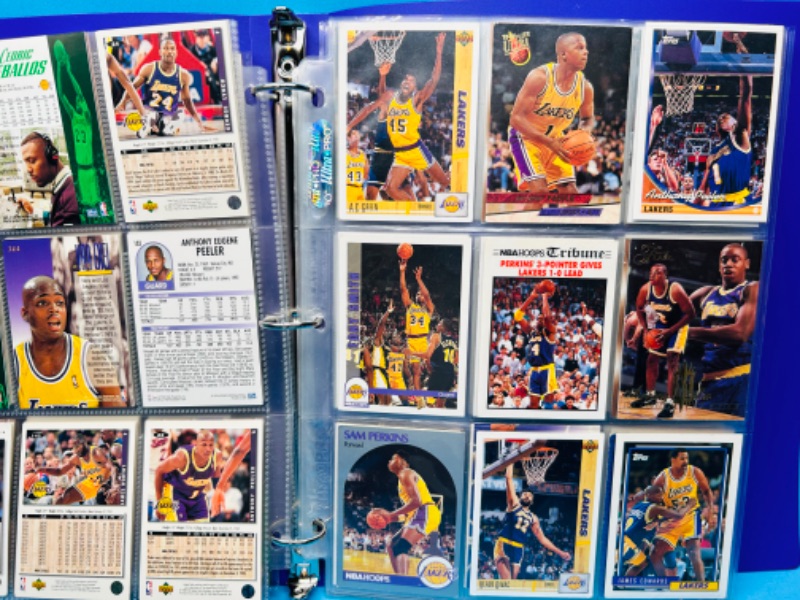 Photo 6 of 686669…90 mixed Lakers basketball team cards in binder 