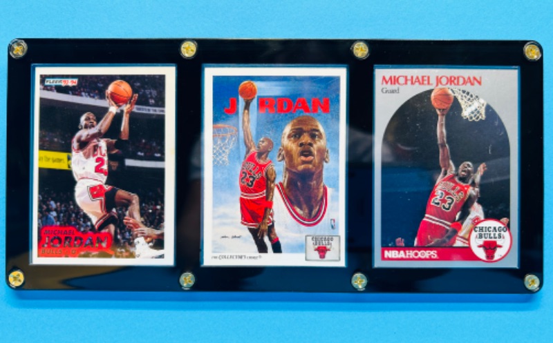 Photo 3 of 686675…3 Michael Jordan cards in display case