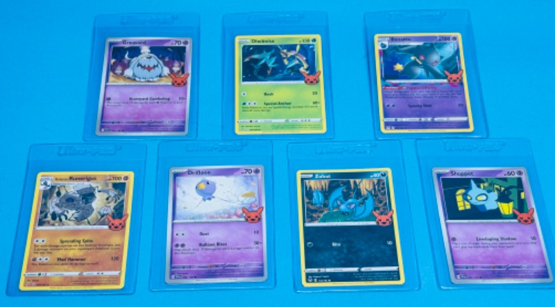 Photo 1 of 686680…7 Pokémon trick or trade cards in hard plastic sleeves 