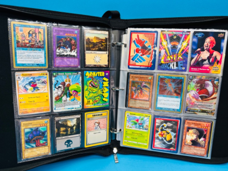 Photo 1 of 686689…234 mixed character and gaming trading cards in binder 