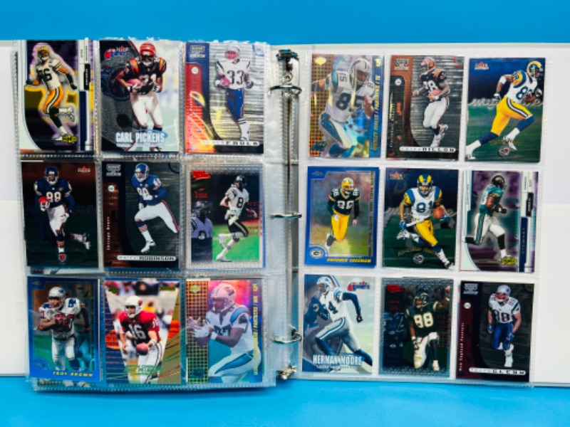 Photo 13 of 686691…270 mixed football refractor, chrome, holo and foil cards in binder