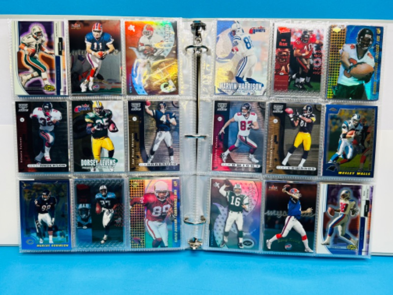 Photo 3 of 686691…270 mixed football refractor, chrome, holo and foil cards in binder