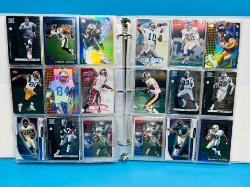 Photo 8 of 686691…270 mixed football refractor, chrome, holo and foil cards in binder