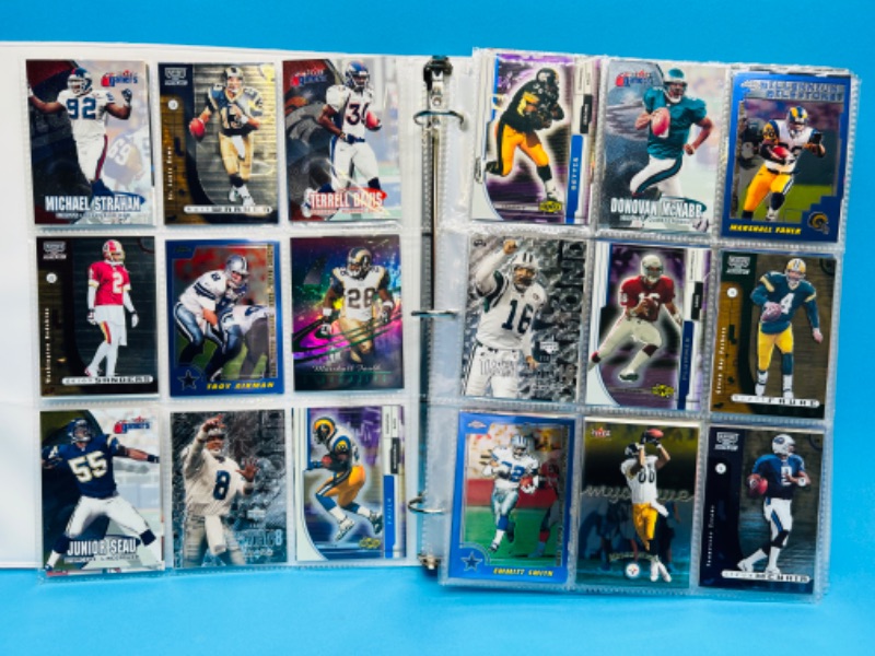 Photo 1 of 686693…270 mixed football refractor, chrome, holo and foil cards in binder