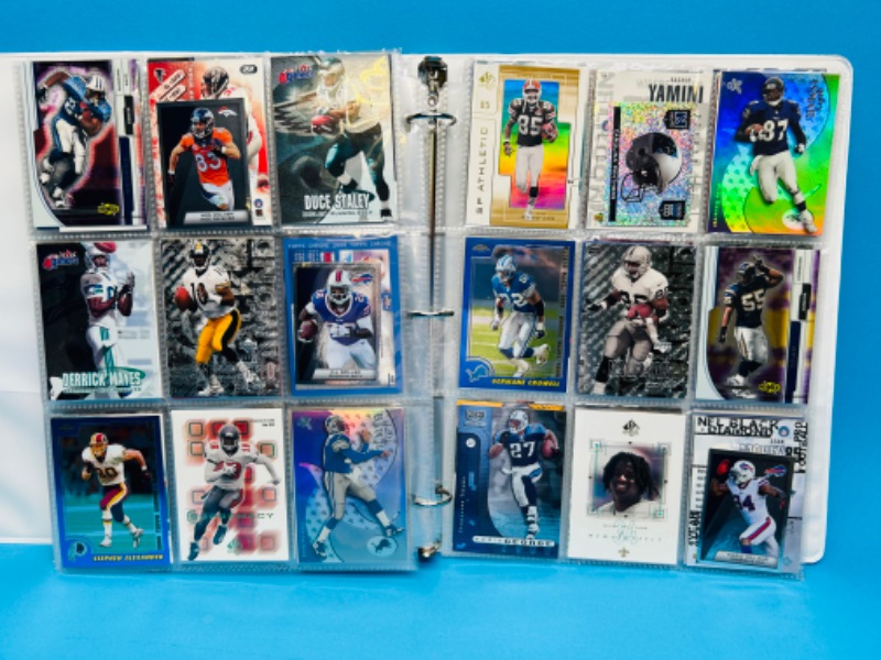 Photo 1 of 686693…270 mixed football refractor, chrome, holo and foil cards in binder