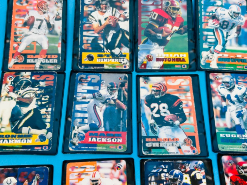 Photo 2 of 686702…1994 Pro Mags football magnets in sleeves- some wear on edges