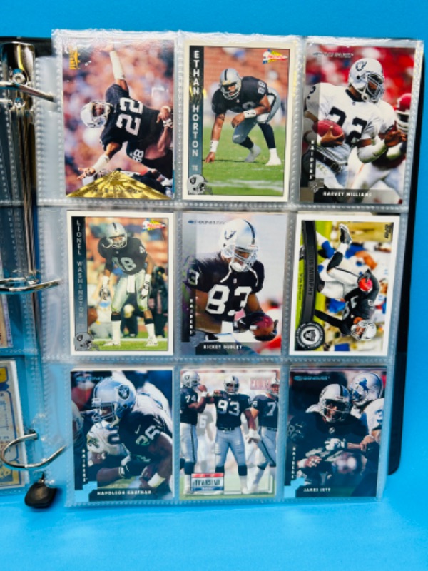 Photo 15 of 686703…153 mixed Raiders football cards in binder 