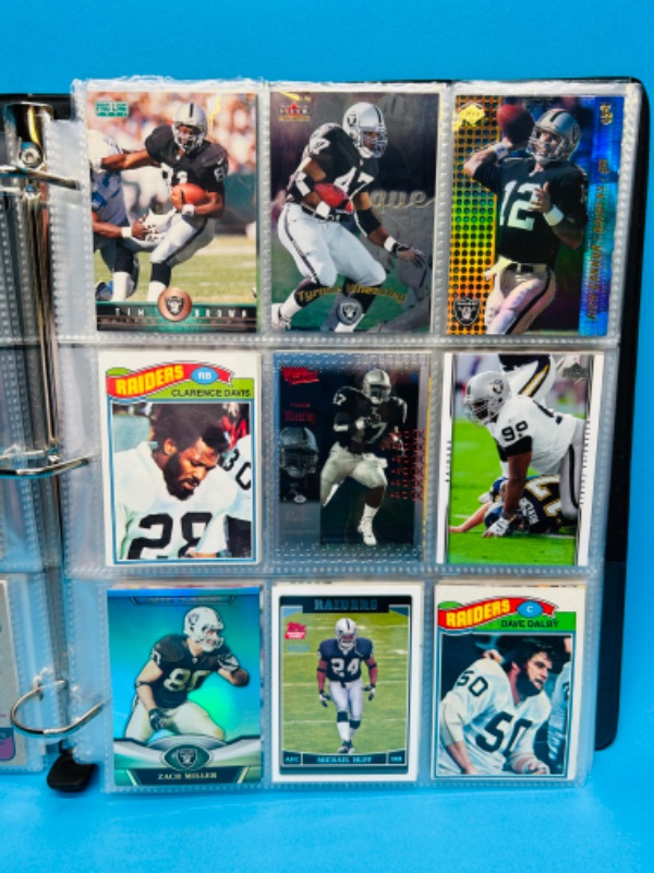 Photo 8 of 686703…153 mixed Raiders football cards in binder 