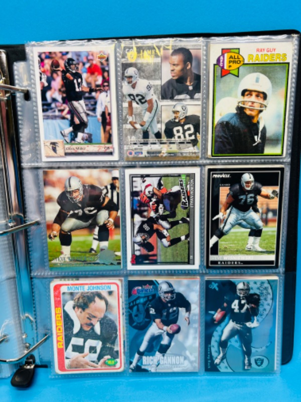 Photo 10 of 686703…153 mixed Raiders football cards in binder 