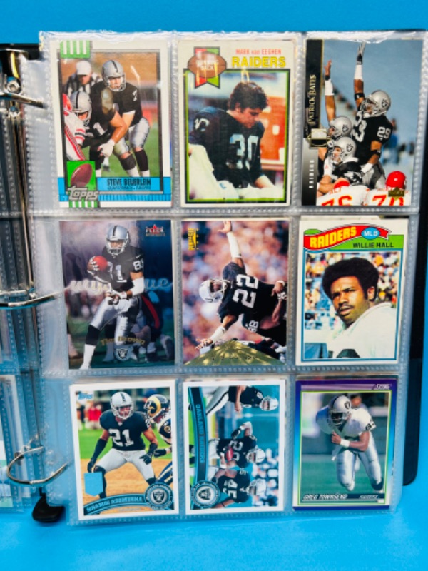 Photo 16 of 686703…153 mixed Raiders football cards in binder 