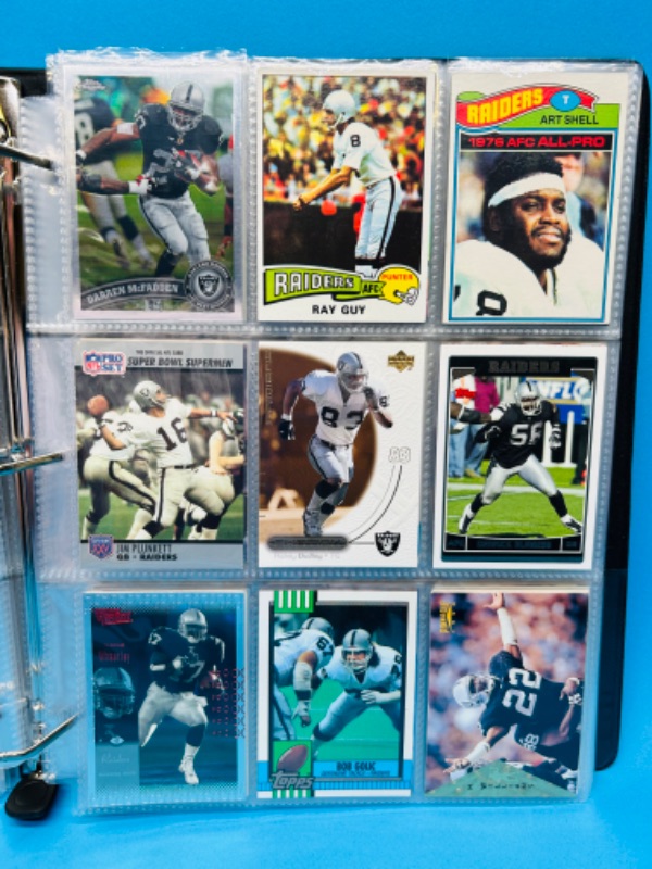 Photo 13 of 686703…153 mixed Raiders football cards in binder 