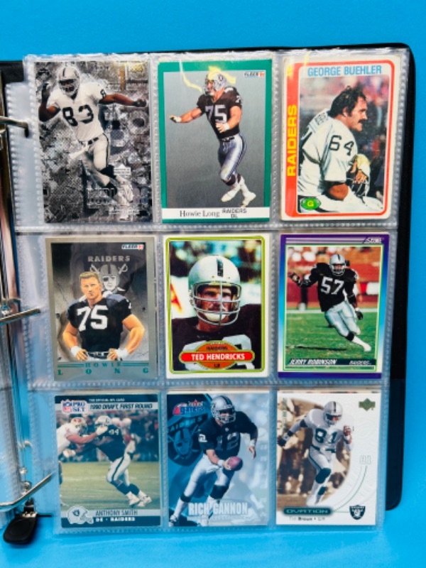 Photo 11 of 686703…153 mixed Raiders football cards in binder 