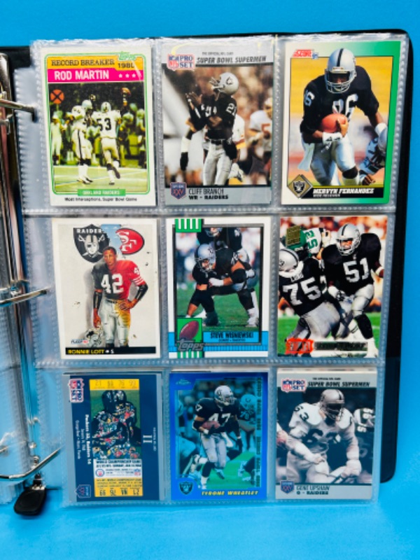 Photo 2 of 686703…153 mixed Raiders football cards in binder 