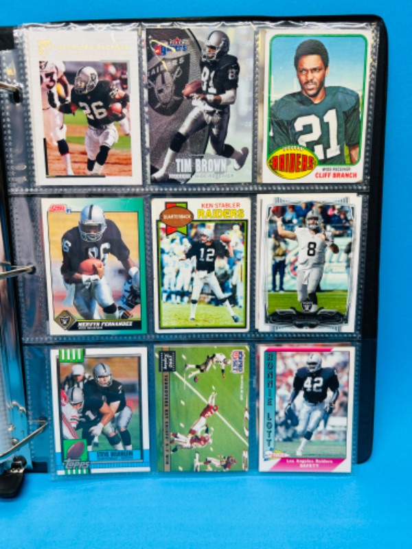 Photo 5 of 686703…153 mixed Raiders football cards in binder 