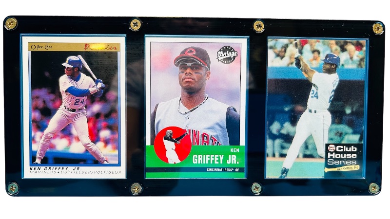 Photo 1 of 686709…3 Ken Griffey Jr. cards in display case 