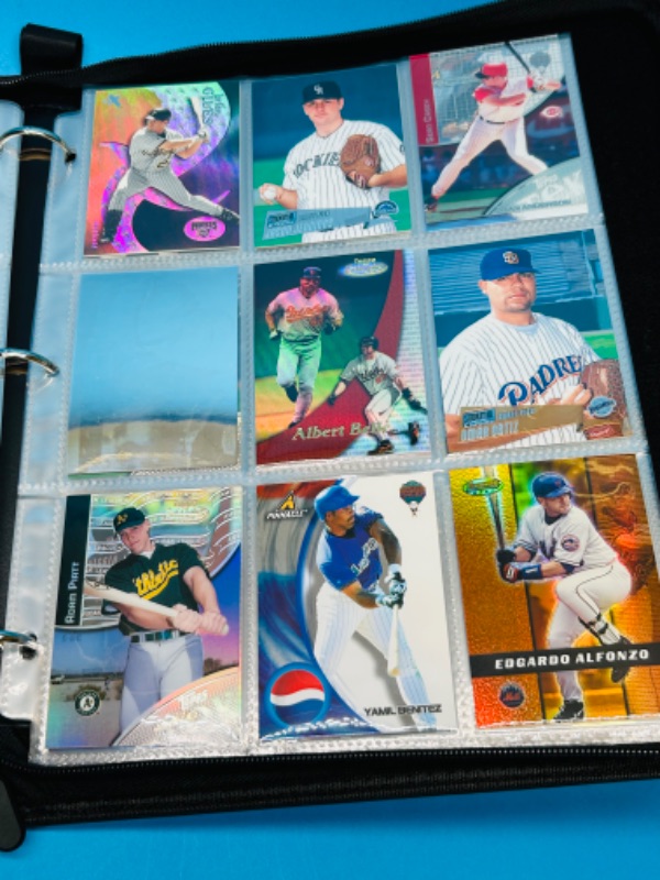 Photo 2 of 686712…171 mixed baseball refractor, holo, chrome, and foil cards in binder 