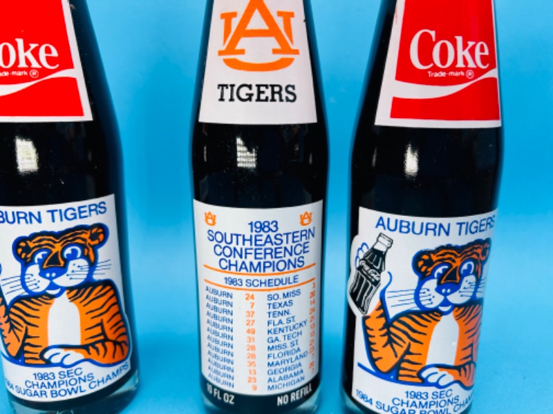 Photo 2 of 686717… 3 vintage Coke Auburn Tigers 1983 SEC and 1984 sugar bowl champs bottles -still full 