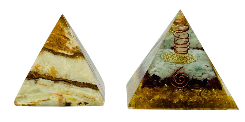 Photo 1 of 686773…2 2” decorative pyramids- 1 is onyx stone the other acrylic 