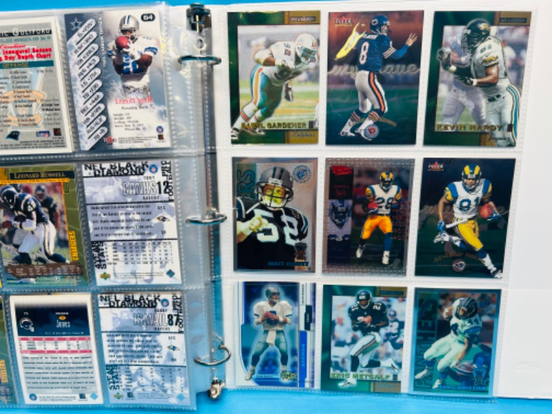 Photo 1 of 686775…final sale no returns/refunds-144 mixed football refractor, chrome, foil, holo cards in binder