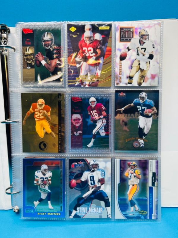 Photo 1 of 686775…final sale no returns/refunds-144 mixed football refractor, chrome, foil, holo cards in binder