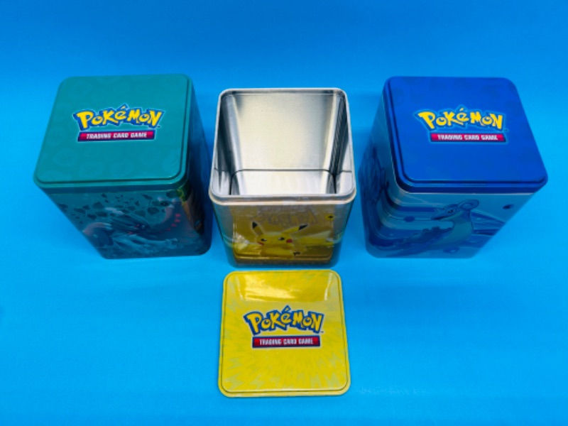 Photo 2 of 686782…3 empty Pokémon TCG tins-empty 