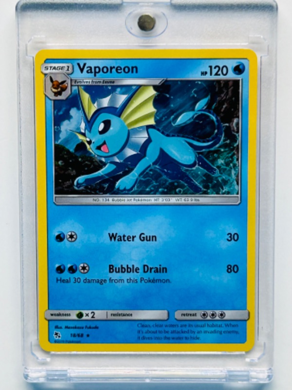 Photo 1 of 686834…Pokémon Vaporeon holo card 18/68  in hard plastic case