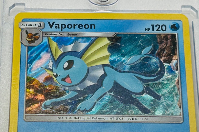 Photo 2 of 686834…Pokémon Vaporeon holo card 18/68  in hard plastic case