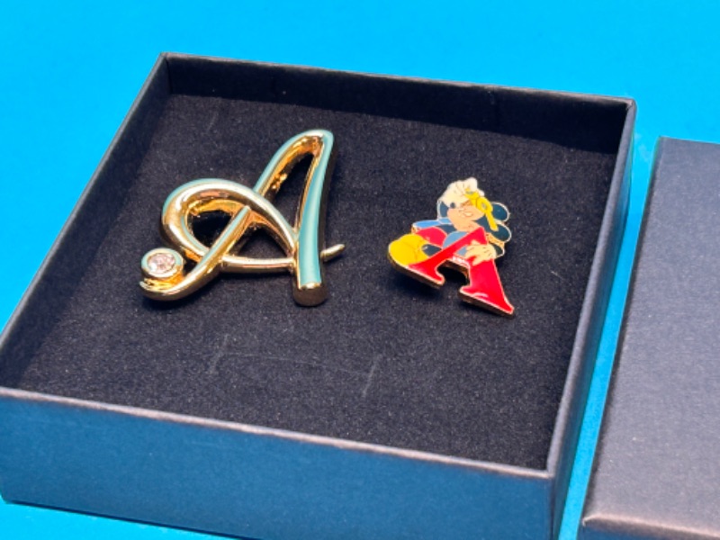 Photo 2 of 686888…2 initial A pins -one Disney one Monet in gift box 