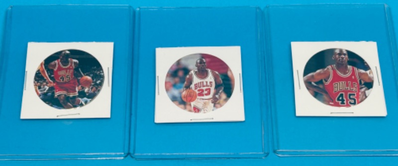 Photo 1 of 686904…3 Michael Jordan milk caps in plastic sleeves 1995