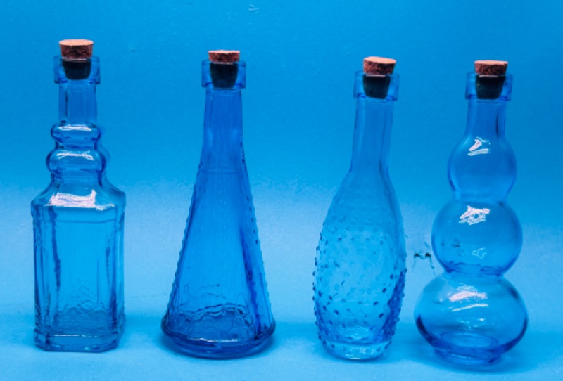 Photo 3 of 686923…4 Blue glass bottles 5” tall