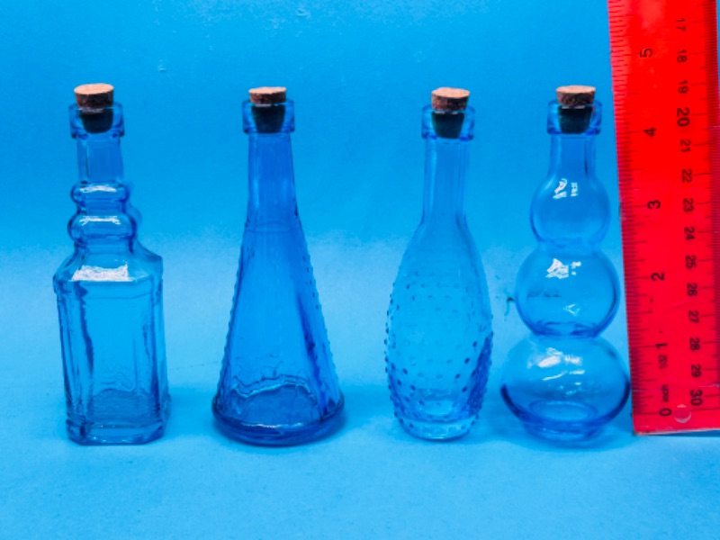 Photo 2 of 686923…4 Blue glass bottles 5” tall