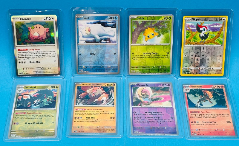 Photo 1 of 686974… 8 Pokémon reverse holo and holo cards in hard plastic cases 