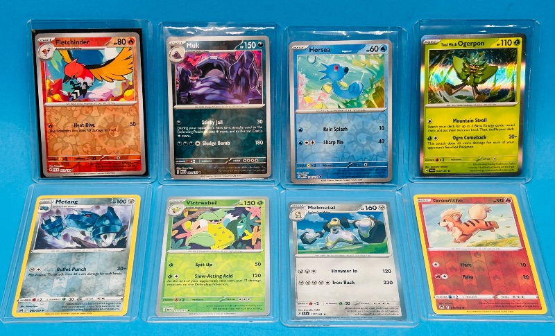 Photo 1 of 686975… 8 Pokémon reverse holo and holo cards in hard plastic cases 