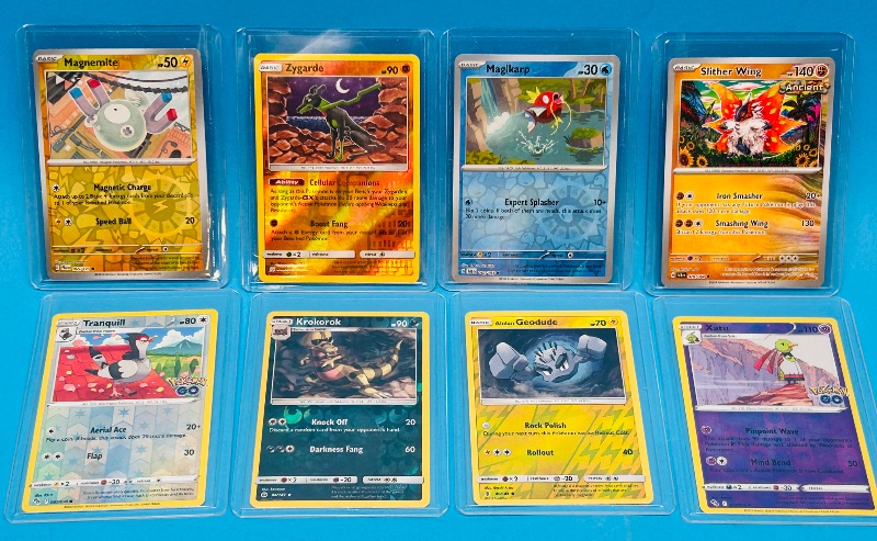 Photo 1 of 686976… 8 Pokémon reverse holo and holo cards in hard plastic cases 