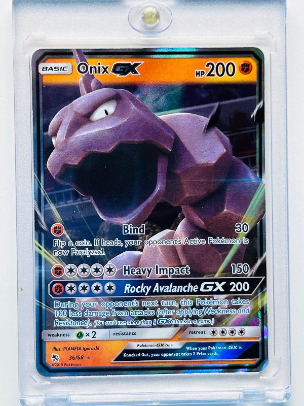 Photo 1 of 686981…Pokémon holo card GX 36/68 in hard plastic case 