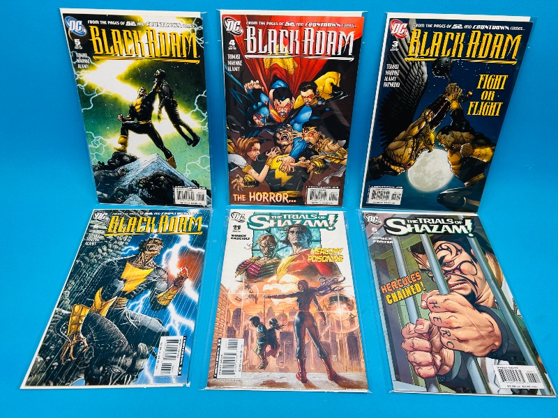 Photo 1 of 687019…black Adam and Shazam  comics in plastic sleeves 