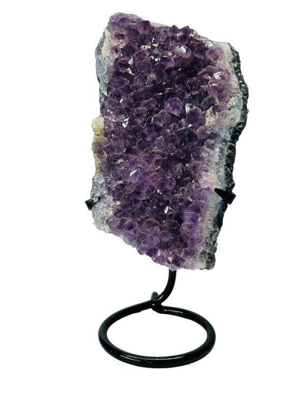 Photo 2 of 687032…  9” amethyst crystal rock on stand- height includes display stand 