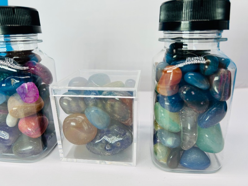 Photo 2 of 687040… small polished rocks in displays 4”bottles