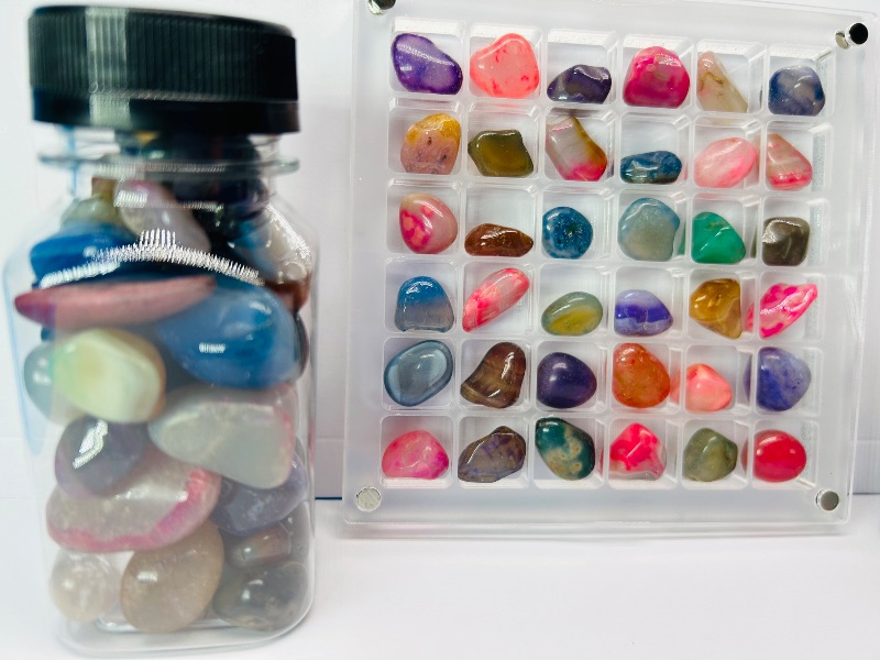 Photo 1 of 687043… small polished rocks in displays 4”bottles