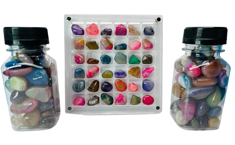 Photo 1 of 687043… small polished rocks in displays 4”bottles