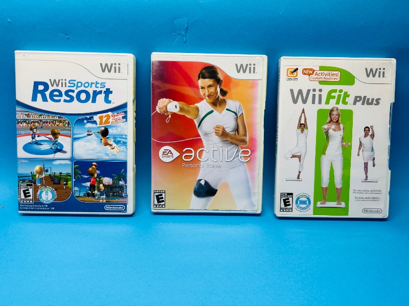 Photo 1 of 687097…3 Wii game discs- damaged cases