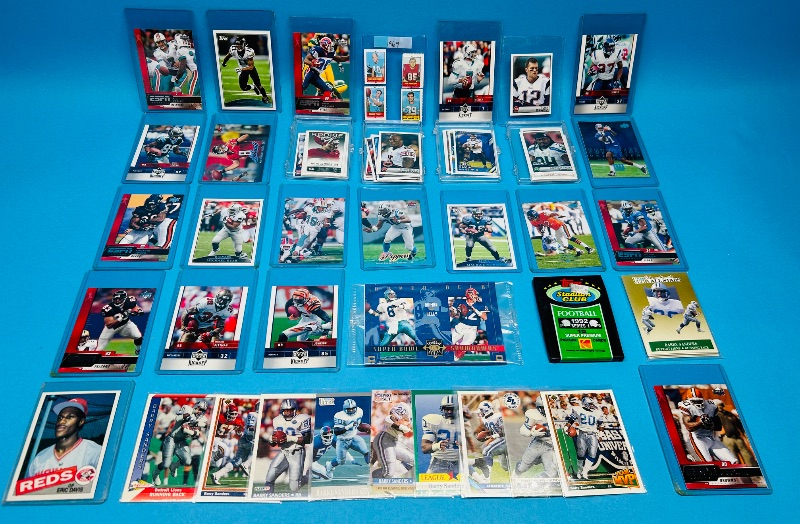 Photo 1 of 687114…final sale no returns/refunds-mixed football trading cards and stickers  in sleeves 