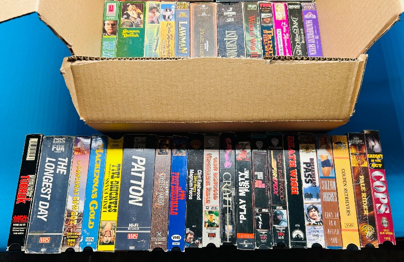 Photo 2 of 687120…final sale no returns/refunds- 40 VHS movie tapes -cases show wear from age